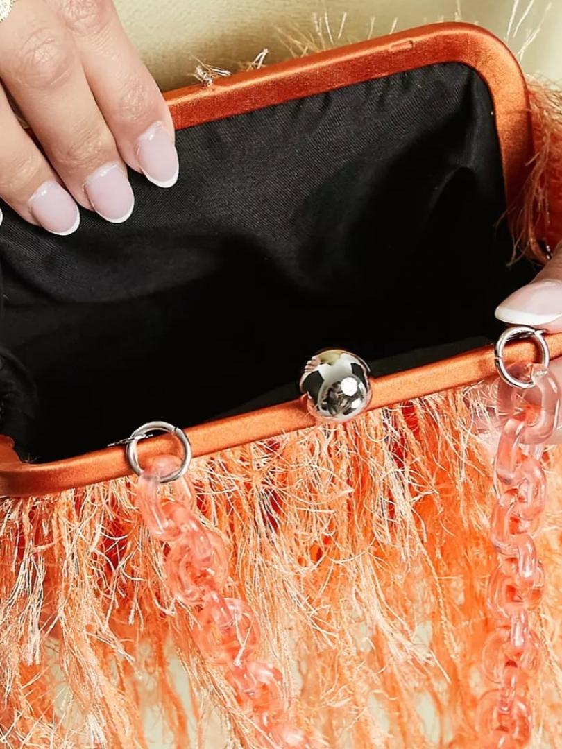 Bolso clutch de plumas naranja clarito. local — foto 3 de 3