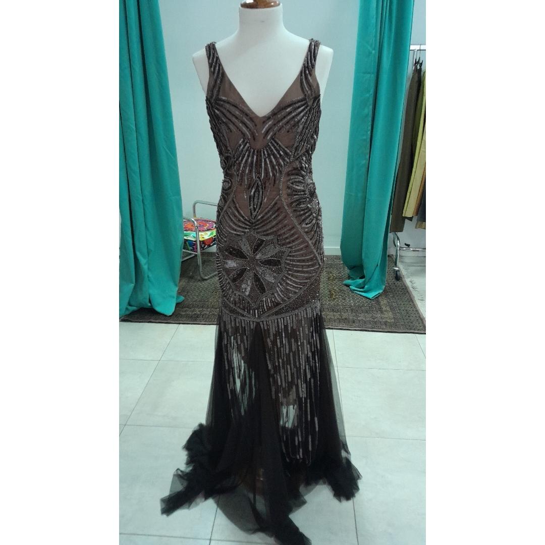 Traje especial de Versace . Bordado a mano