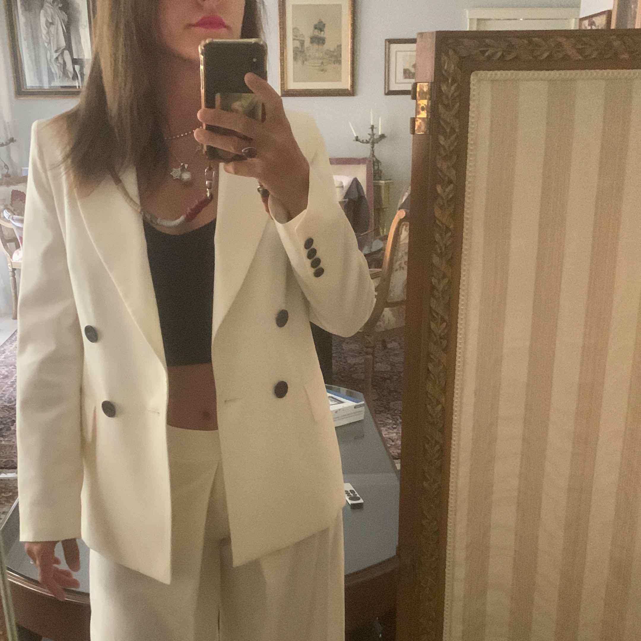 Traje Chaqueta y pantalón con pliegues Angel Schlesser — foto 1 de 2