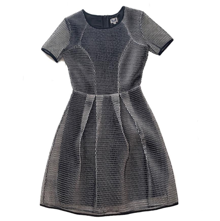 Minivestido con falda evasé de Adolfo Domínguez — foto 1 de 2
