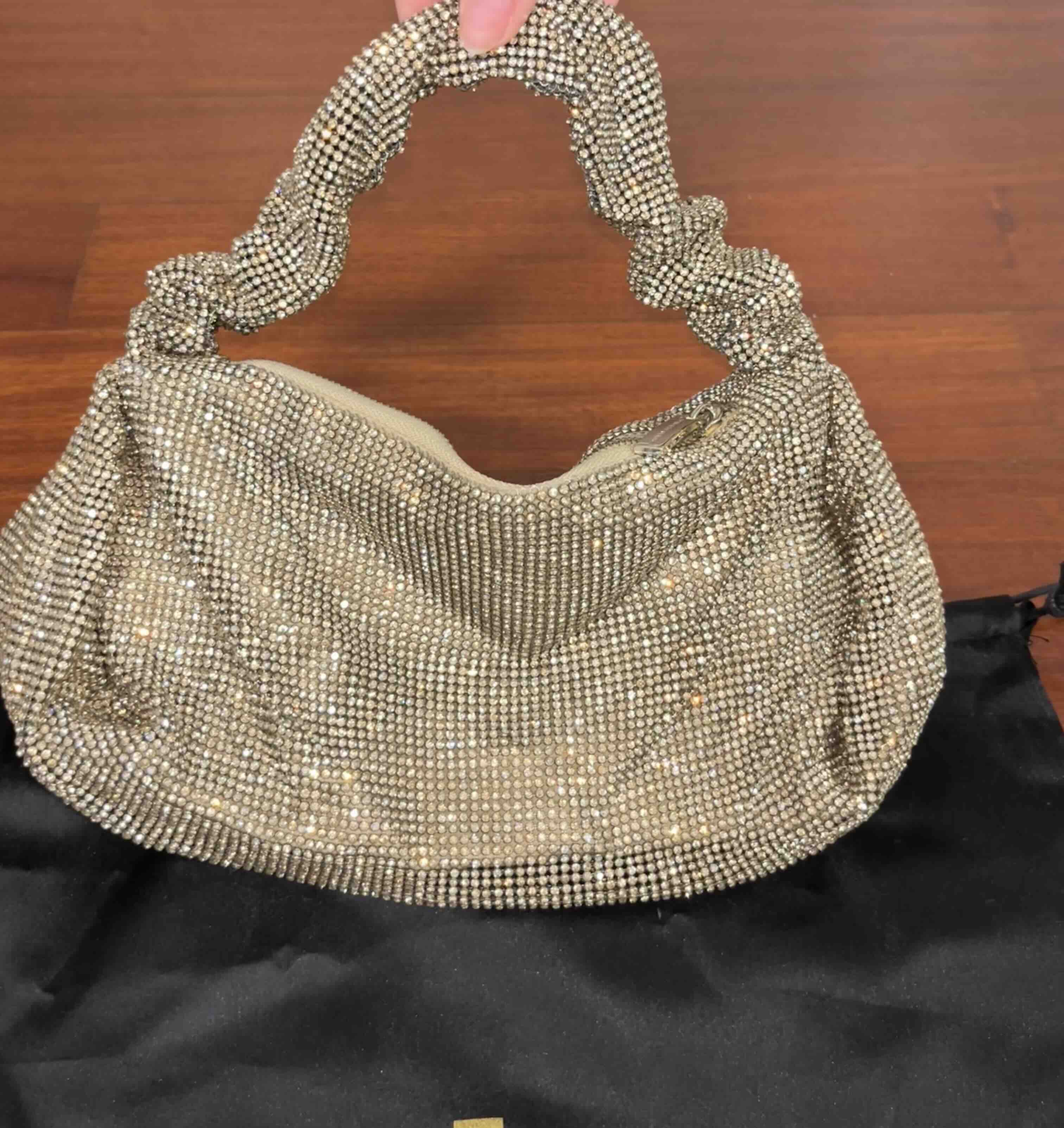 Bolso de fiesta dorado con cristales Roberto Verino — foto 2 de 6